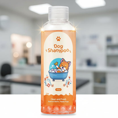 A 150ml bottle of dog shampoo with a clear cap and a white label featuring a cartoon puppy in a blue bath tub. The bottle is filled with orange-colored liquid and contains small orange beads at the bottom, set against a plain white background.
